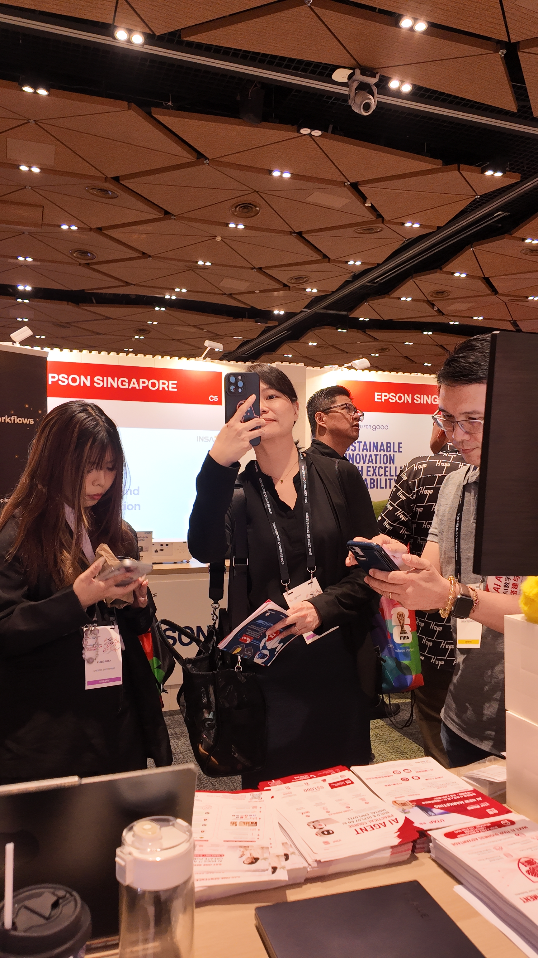 Visitors at the BeeAI booth