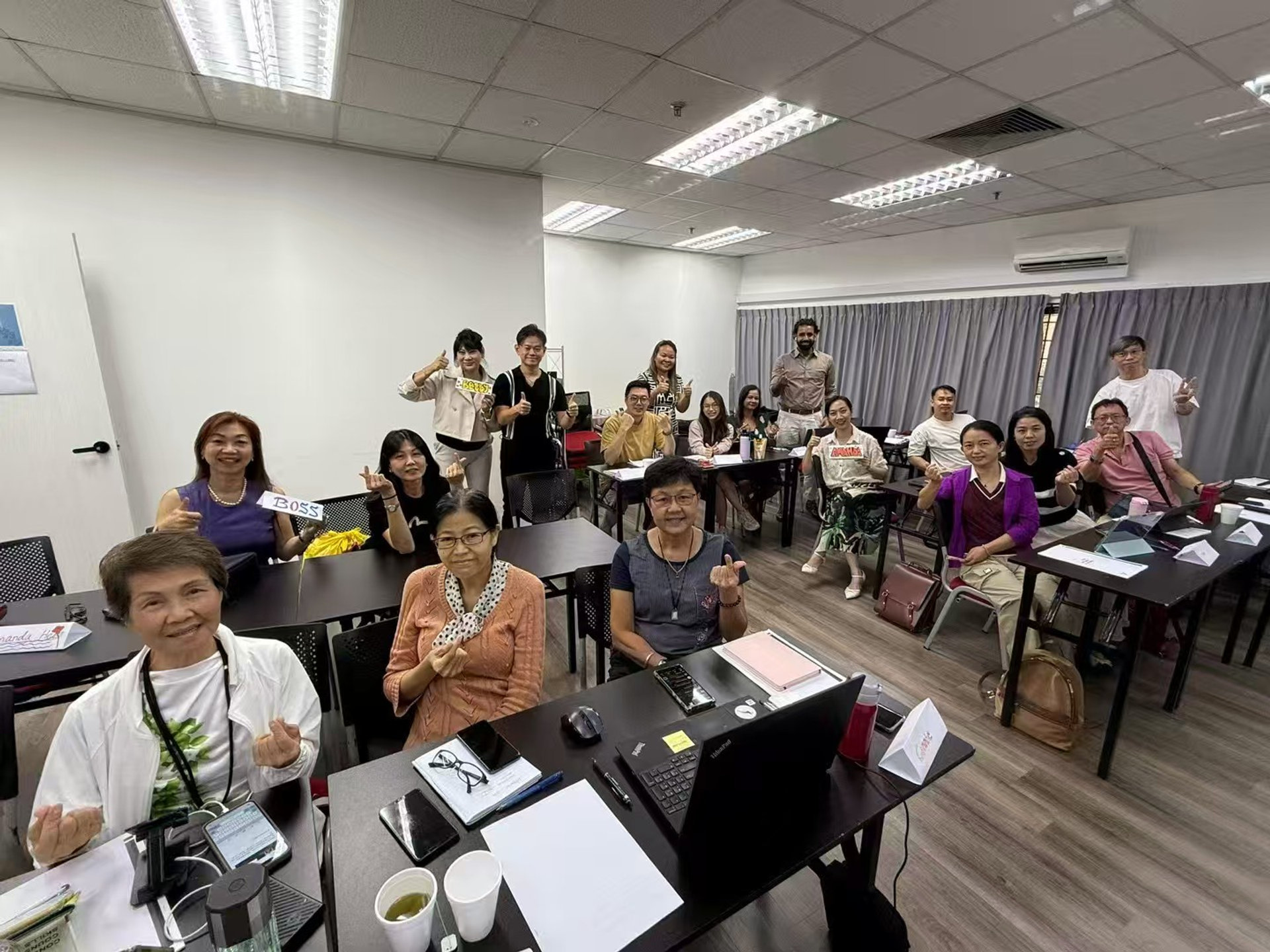 AI workshop participants giving thumbs up